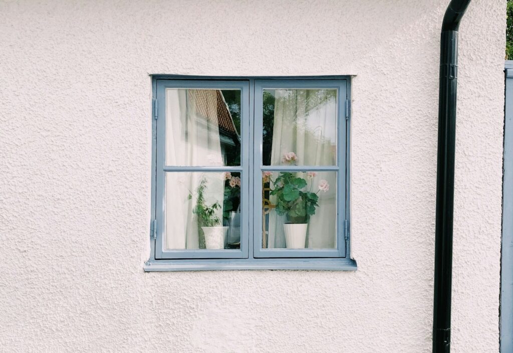 Casement replacement window on a home exterior