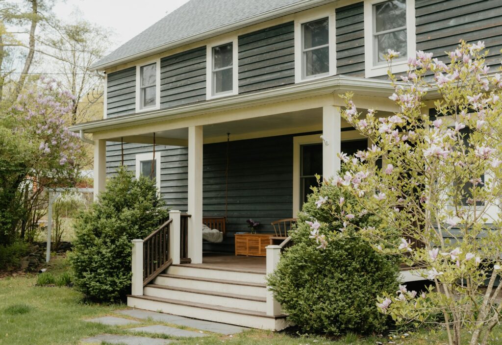 American home front entry and porch with replacement door